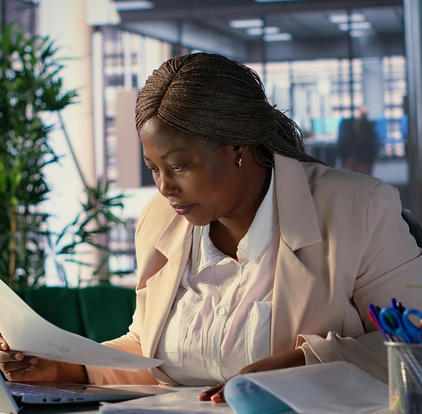 African professional taxpayer reviewing his tax obligations on the RAS platform
